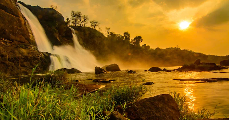 Capture the sunset views of Athirapally falls